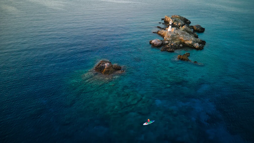 a group of rocks in the water