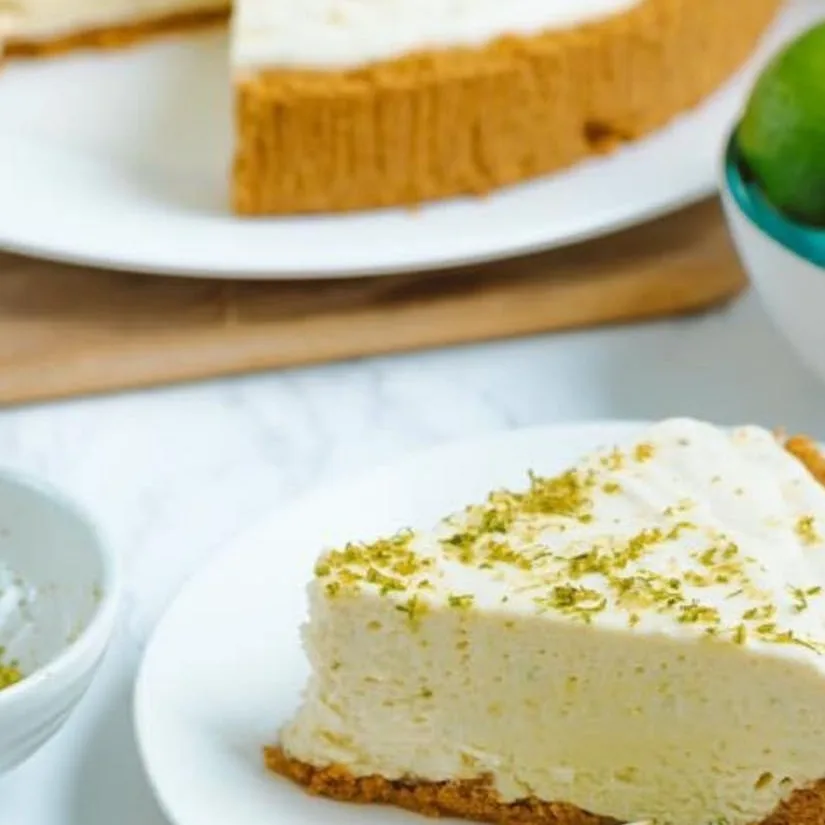 Sliced Key Lime Pie on White Ceramic Plate